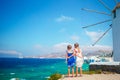 Adorable little girls with amazing view on Little Venice the most popular tourist area on Mykonos island Royalty Free Stock Photo