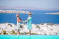 Beautiful girls enjoy greek vacation on Little Venice background. Royalty Free Stock Photo