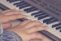 Beautiful girls hands playing electronic piano keyboards. Royalty Free Stock Photo