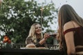 Beautiful girls having some wine