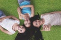 Beautiful girls lying down on the grass Royalty Free Stock Photo