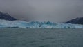 Beautiful glacier Perito Moreno. A wall of blue ice rises above a turquoise glacial lake. Royalty Free Stock Photo