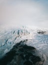 Beautiful glaciers flow through the mountains in Iceland. Aerial view and top view. Royalty Free Stock Photo