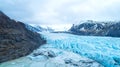 Beautiful glaciers flow through the mountains in Iceland. Aerial view and top view Royalty Free Stock Photo