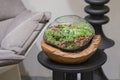 Beautiful glass florarium with succulents and with wooden decor in the interior