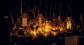 Beautiful glowing golden yellow filament bulbs at night Royalty Free Stock Photo