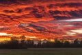 Beautiful glowing sky above the plain at sunset Royalty Free Stock Photo