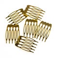 Beautiful gold hairpins, stars, various hair decorations isolated on a white background