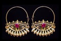 Beautiful gold ornaments on a dark background. jewelry for women. necklace and earrings