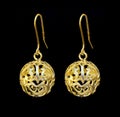 Beautiful gold ornaments on a dark background. jewelry for women. necklace and earrings