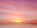 Beautiful gold  pink sunset at sea  water reflection sun light on  gold yellow  clouds sky  nature background Royalty Free Stock Photo