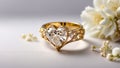 Beautiful gold ring with diamond in the shape of a heart, flowers