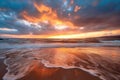 beautiful golden beach sunset with colorful sky and stormy clouds Royalty Free Stock Photo