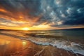 beautiful golden beach sunset with colorful sky and stormy clouds Royalty Free Stock Photo