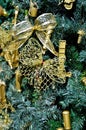 Beautiful golden bows decorating Christmas tree