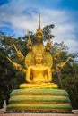 Beautiful golden Buddha statue with seven Phaya Naga heads under Royalty Free Stock Photo