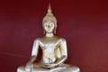 beautiful golden buddha in thai temple red wall background faith buddhism Royalty Free Stock Photo
