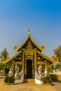 Beautiful golden Buddhist church in Lanna style architecture at Wat Inthakin Sadue Muang, Chiang Mai, Thailand. Wat Inthakin is th Royalty Free Stock Photo