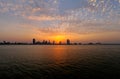 Beautiful golden clouds and Bahrain skyline at sunset Royalty Free Stock Photo