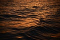 Beautiful golden colors of sunset over sea waves Royalty Free Stock Photo