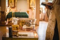 Beautiful golden cross in male hands of priest wearing gold robe on ceremony in christian cathedral church, holy sacramental event