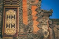 Beautiful golden door and red wall in Ubud Palace