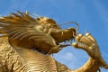 Beautiful golden dragon statue forced power gold sky yellow