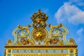 This is the beautiful golden entrance gate to the famous palace of Versailles in France Royalty Free Stock Photo