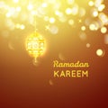 Beautiful Golden lamp , Ramadan Kareem greeting on gold bokeh background