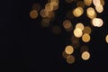 Beautiful golden lights on dark. Bokeh effect Royalty Free Stock Photo