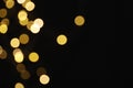Beautiful golden lights on dark. Bokeh effect Royalty Free Stock Photo