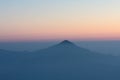 Beautiful golden natural sunlight and twiligh of sunrise shining to in the mist on valley of mountain