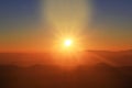 Beautiful golden natural sunlight and twiligh of sunrise shining to in the mist on valley of mountain in Thailand