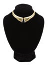 Beautiful golden necklace on black mannequin isolated on white Royalty Free Stock Photo