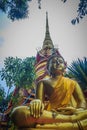 Beautiful golden pagoda with decorative Thai style fine art at public Buddhist Wat Phu Phlan Sung temple, Nachaluay, Ubon Ratchath Royalty Free Stock Photo