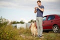 Happy labrador enjoy playing with owner outdoor. Royalty Free Stock Photo