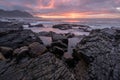 A beautiful golden seascape taken on a stormy cloudy morning at sunrise Royalty Free Stock Photo