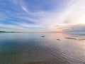 beautiful golden sun light sunrise in morning sea behind island. Fresh air and calm romantic place in thailand Royalty Free Stock Photo