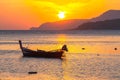 beautiful golden sunrise above fishing boats in Rawai sea Royalty Free Stock Photo