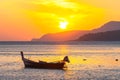 Beautiful golden sunrise above fishing boats in Rawai sea Royalty Free Stock Photo