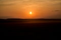 A beautiful Golden Sunset on a hay field Royalty Free Stock Photo