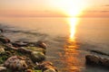 Beautiful golden sunset over Black sea rocky coastline in Crimea Royalty Free Stock Photo