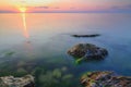 Beautiful golden sunset over Black sea rocky coastline in Crimea Royalty Free Stock Photo