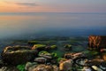 Beautiful golden sunset over Black sea rocky coastline in Crimea Royalty Free Stock Photo