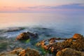 Beautiful golden sunset over Black sea rocky coastline in Crimea Royalty Free Stock Photo