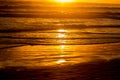 Beautiful golden sunset on sea beach Royalty Free Stock Photo