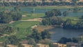 Beautiful golf course near modern skyscrapers of Dubai Marina timelapse in luxury Dubai city, United Arab Emirates Royalty Free Stock Photo