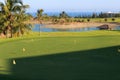 Golf course at the ocean side at sunset Royalty Free Stock Photo