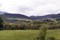 Beautiful gorge among the mountains covered with green vegetation and trees in the spring Royalty Free Stock Photo