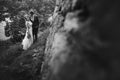 Beautiful gorgeous bride and groom posing. happy wedding couple hugging and embracing at old castle. happy romantic moments. Royalty Free Stock Photo